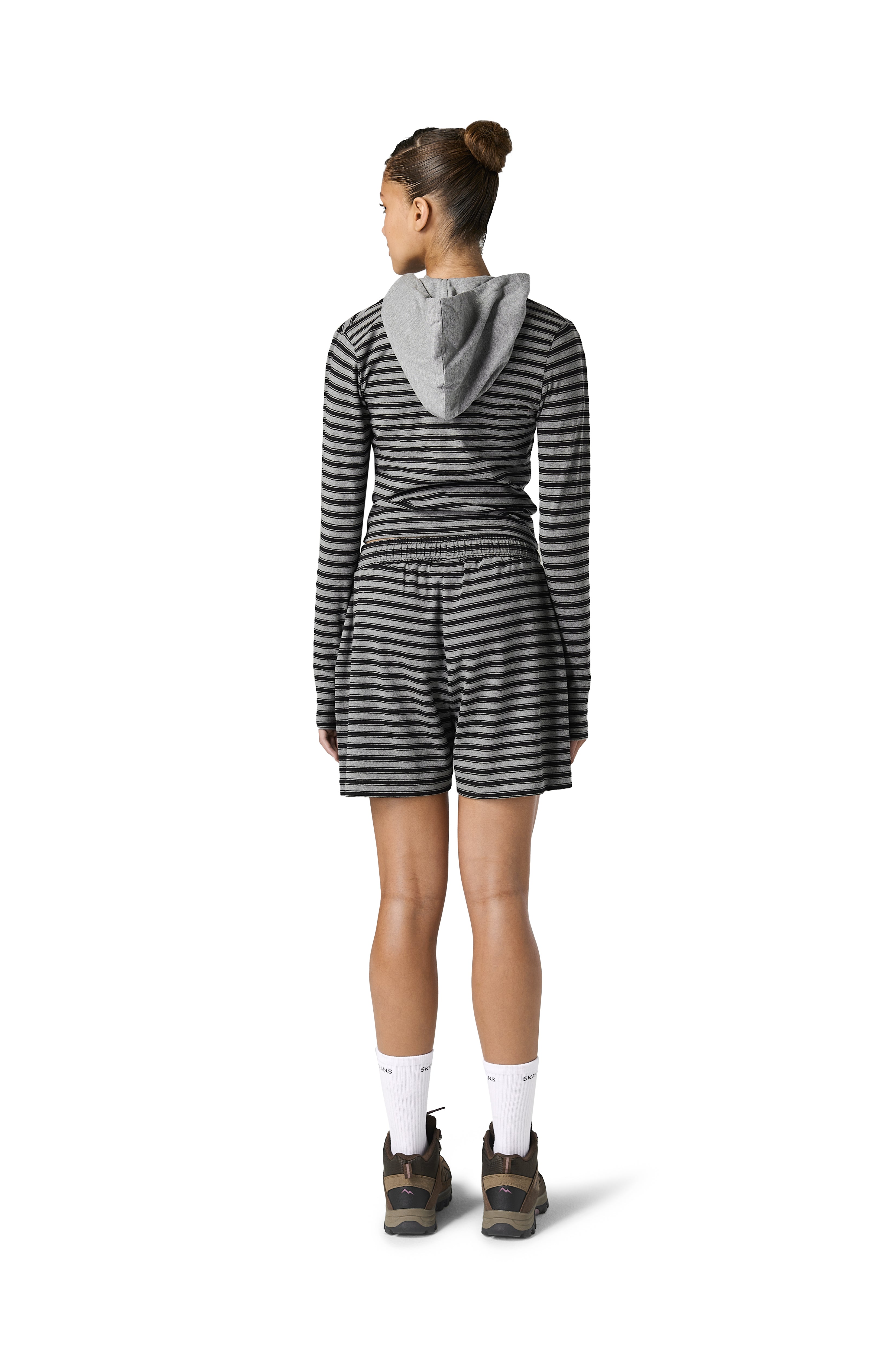 Model Iman is 5'9.5" and wears size S.